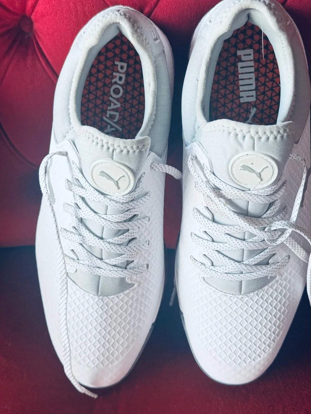 Puma White Trainers with Red Outsole Detail